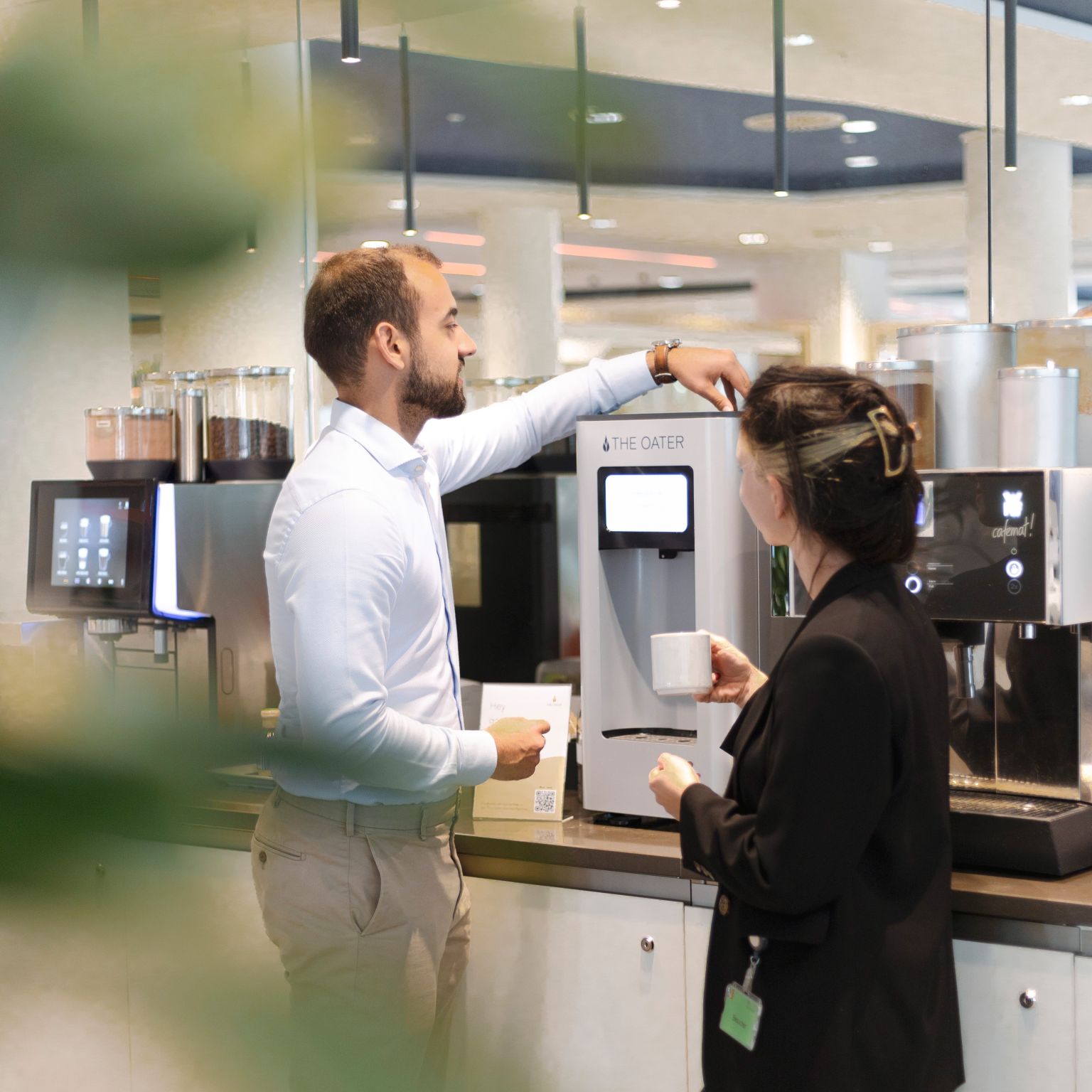The Oater oat drink machine in use in an office